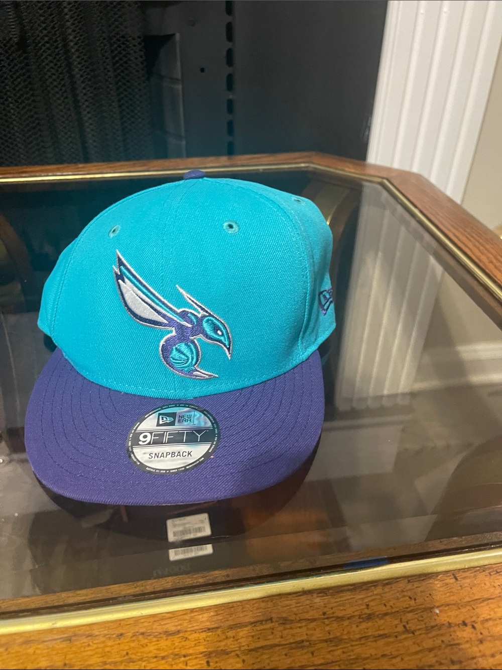 New Era Teal and Purple Hornet Logo Snapback Hat